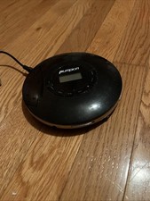 Portable CD player With Light Up Screen, Easy Buttons. Comes With Charging Cord