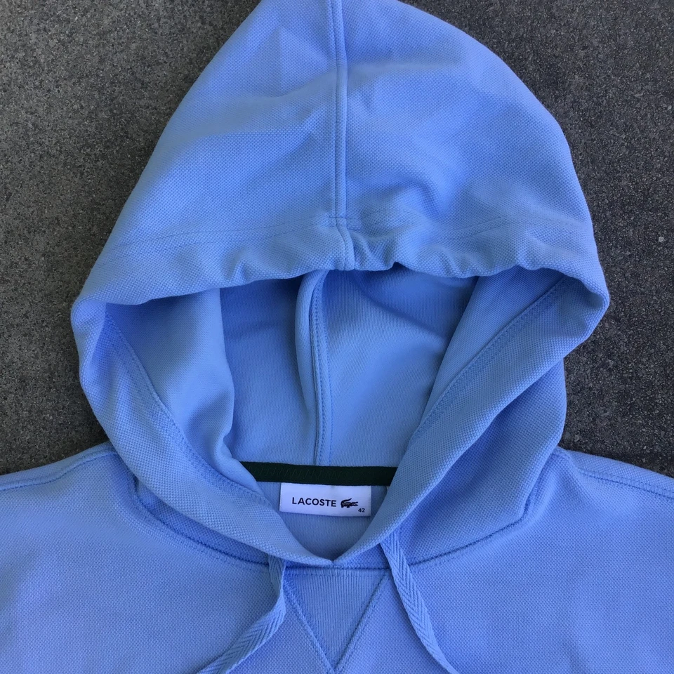 Conjunto de sudadera con capucha suéter (42) y pantalones deportivos Lacoste para mujer (42) azul Foto 3 de 4