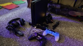 Play Station Slim 1- TB, 3 Controllers, 10 Games, 1 USB mic.  1 Fan/Charge Stand