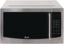 Compacto 1,1 Cu. Horno microondas Ft. 1000W - La energía se adapta a la comodidad