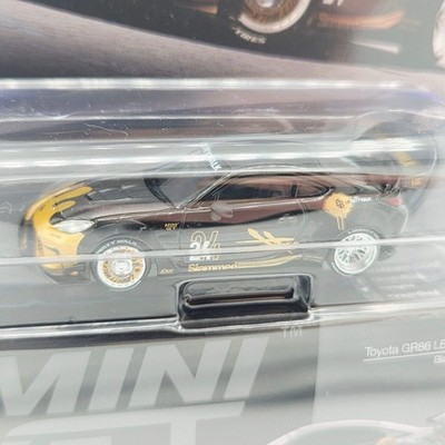 Mini GT Toyota GR86 LB Nation - 1:64, Black/Gold (2026 Limited