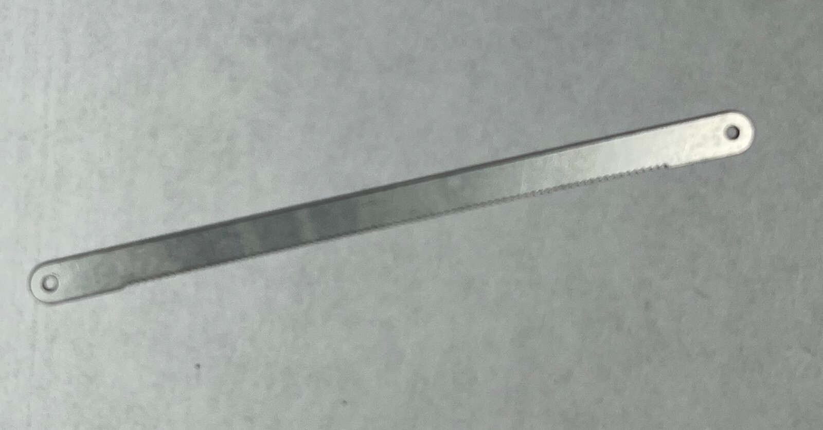 Micro Escape Tool A tiny easily concealed handcuff shim pick with built ...