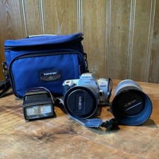 Vintage Minolta STsi 35mm Camera with two lenses, bag, accessories 