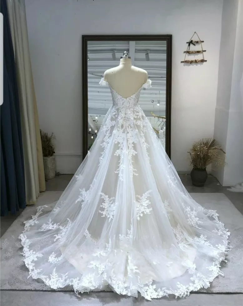 Champagne and white lace wedding dress store