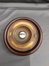 VINTAGE BRASS ENTRANCE DOOR BELL WITH MAHOGANY SURROUND