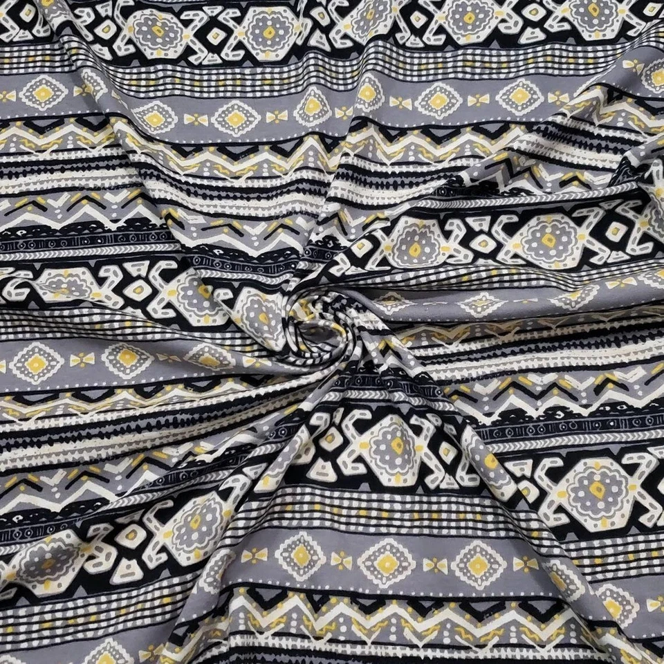 Tela de spandex de algodón con estampado tribal negro, amarillo, gris y blanco Foto 2 de 4