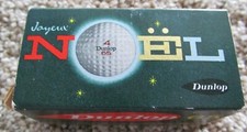 2 WRAPPED DUNLOP 65 GOLF BALLS VERY NICE CONDITION IN A DUNLOP 65 CHRISTMAS BOX