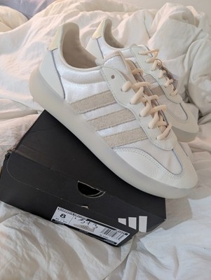 Adidas Barreda Decode sneaker in a core white and off-white colorway.