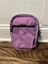 Alpaka Vertical Sling Crossbody Travel Pack Purple