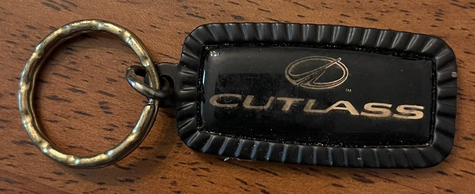 Porte clés vintage Cutlass Supreme années 80 neuf avec étiquette ??