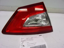 Used Left Tail Light Assembly fits: 2013 Ford Fusion lid mounted Hybrid SE L. Le