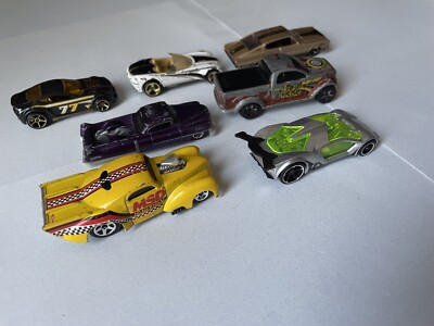 lot 7 hot wheels Toy cars no years on bottom, willys, tongue twister, impavido