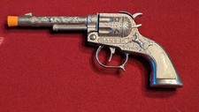 VINTAGE BUZZ HENRY, '' GENE AUTRY '' CAP GUN WITH IMBEDDED GRIPS WORKING