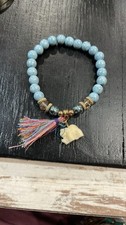 Sky Blue Beaded Bracelet With Tan Elephant Charm
