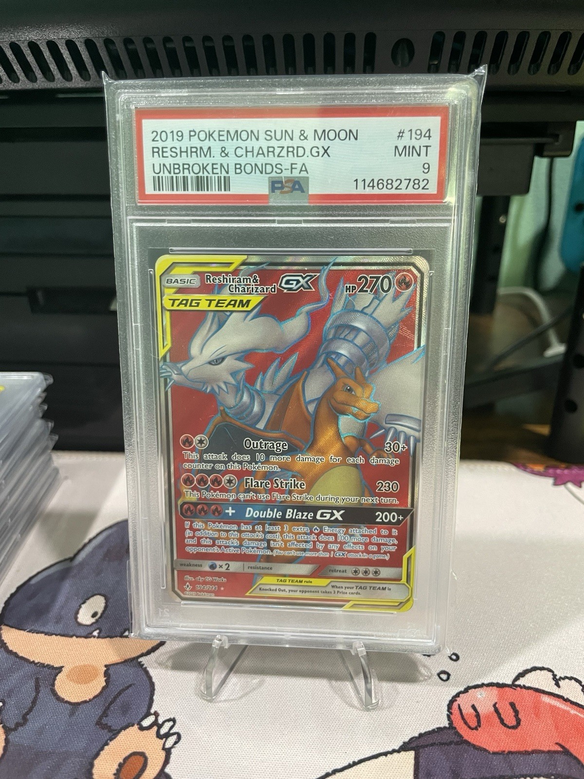 Pokémon Reshiram & Charizard GX Full Art Unbroken Bonds 194/214 PSA 9