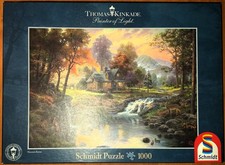Schmidt "Thomas Kinkade" Puzzle 1000 Teile: Painter of Light - Holzhaus am Bach
