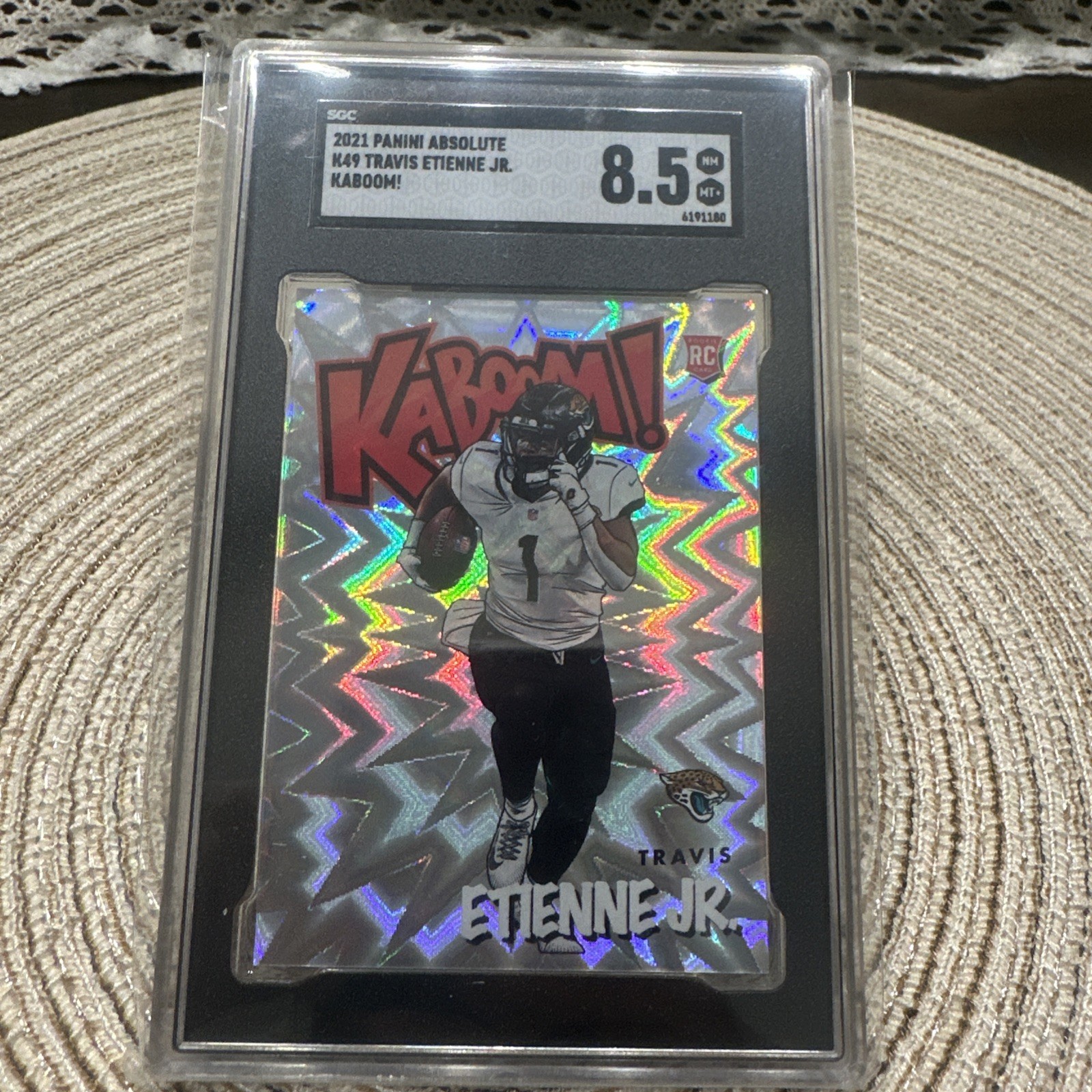 2021 Absolute Kaboom #49 Travis Etienne Jr. RC Rookie SP SGC 8.5 Jaguars