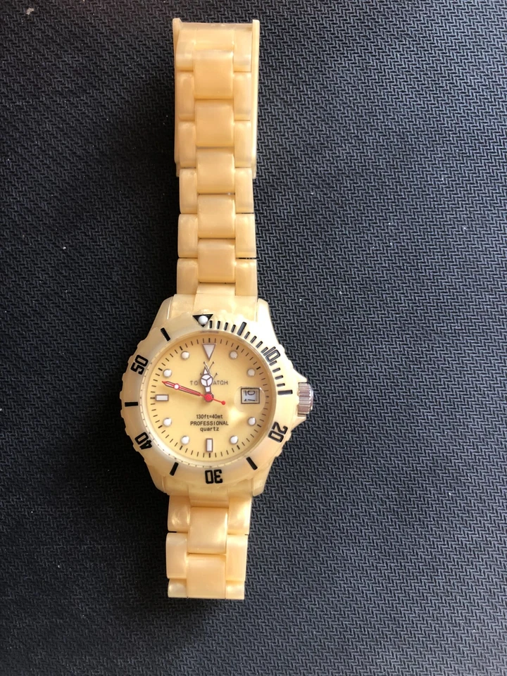 Reloj de cuarzo ToyWatch para mujer color oro amarillo perlado plasmático  Foto 2 de 4