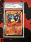 2013 Pokemon TCG Charizard Plasma Storm Secret Rare Holo 136/135 AGS 8.5