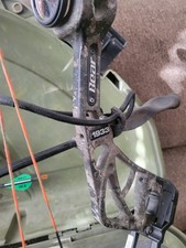 Bear Species RH Compound Bow 55-70#, 23.5-30.5" draw length. 4 pin sight.