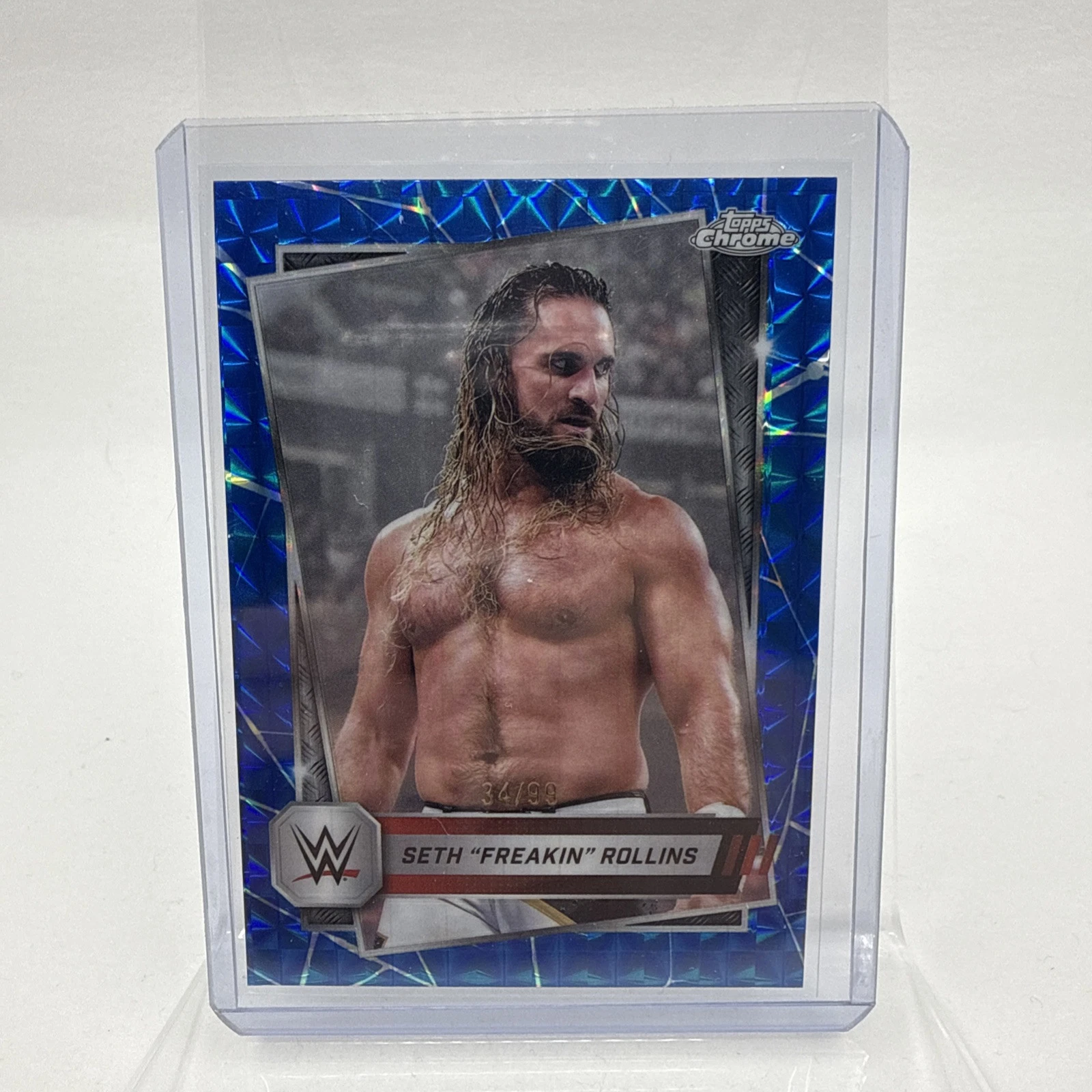2025 Topps Chrome WWE Seth “Freakin” Rollins Blue Geometric Refractor /99 #5