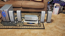dolby atmos home theater system 1-Subwoofer, 1 Amp, 1 center speaker. 4 speakers