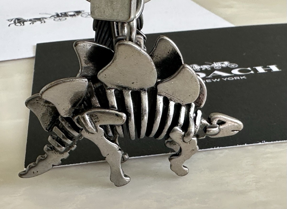 COACH STEGGY STEGOSAURUS & FEATHER NICKEL BAG CHARM KEYRING 65134