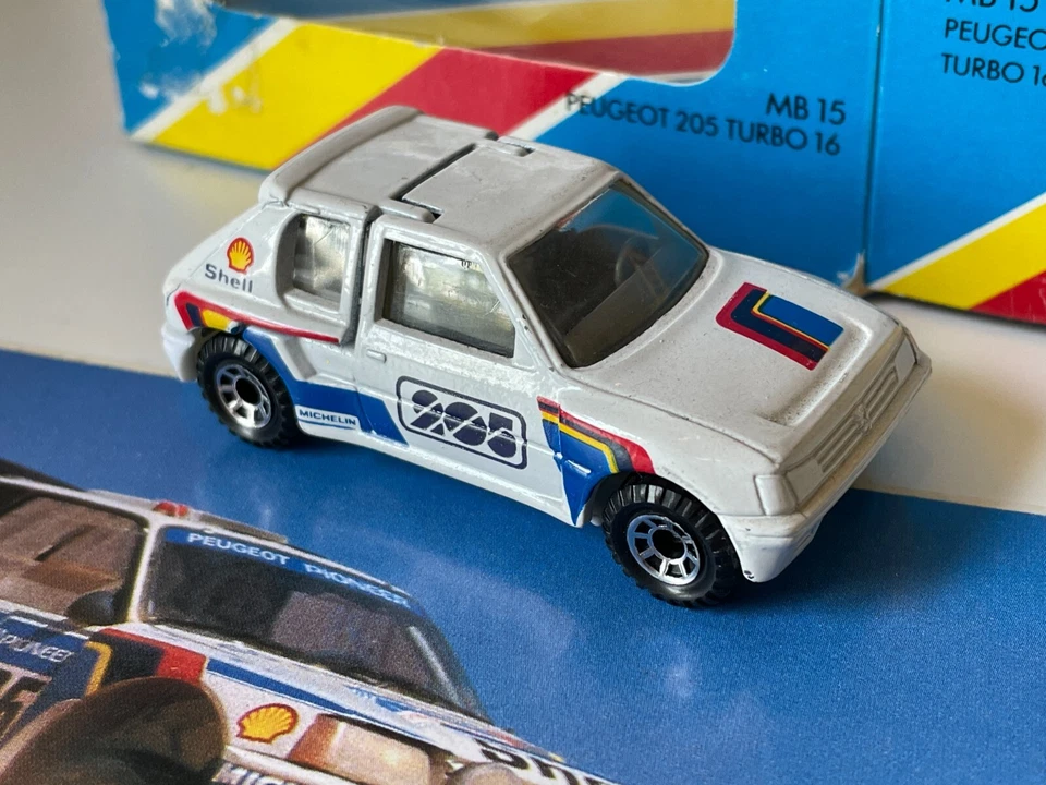 Matchbox 1/55 - Peugeot 205 Gti Rally 1984 en caja original + tarjeta de bonificación Foto 2 de 4