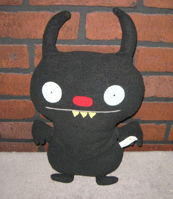 black ugly doll