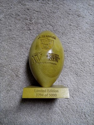 Oakland/Los Angeles Raiders Wooden Super Bowl trophy football. 