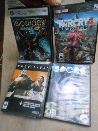 Lot of 4 Sci-fi Fantasy PC CD-ROM Computer Games Bioshock Farcry Spore Half-Life