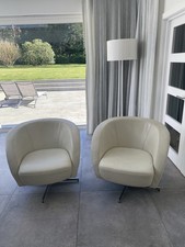 Heals Leather Chrome Cream Swivel Chairs Pair