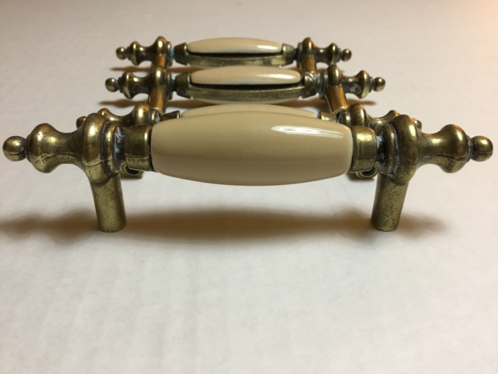 VINTAGE TAN PORCELAIN/CERAMIC & BRASS / DRAWER PULLS! 4 3/4