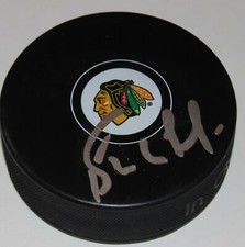 BERNIE NICHOLLS signed (CHICAGO BLACKHAWKS) souvenir logo hockey puck W/COA
