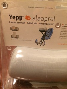 baby sleeping in bike seat