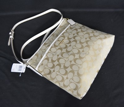 cream colored crossbody bag