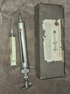 Vintage Veterinary syringe and its storage box
