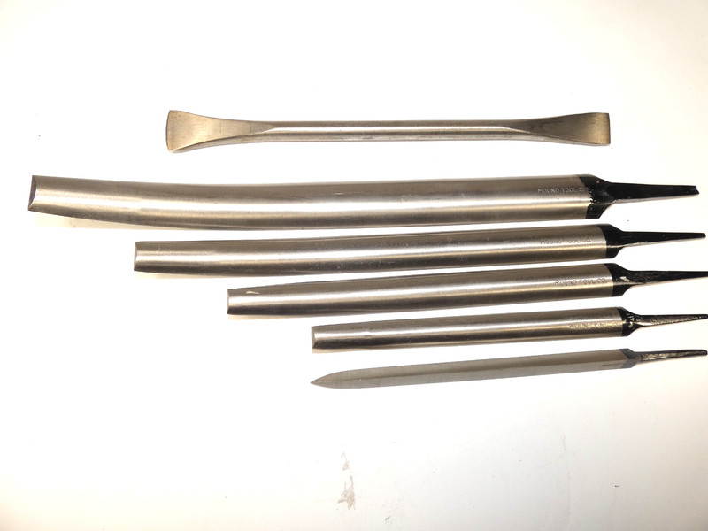 Set of six Mound Tool Steel scrapers; wood, sculpture