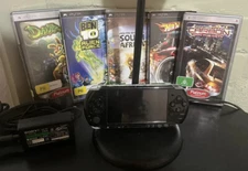 PSP 3002  console x 5 games 