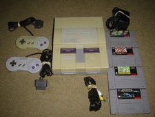 Super Nintendo Entertainment System CONSOLE W/ 2- CONTROLLERS AND 4 GAMES TESTED
