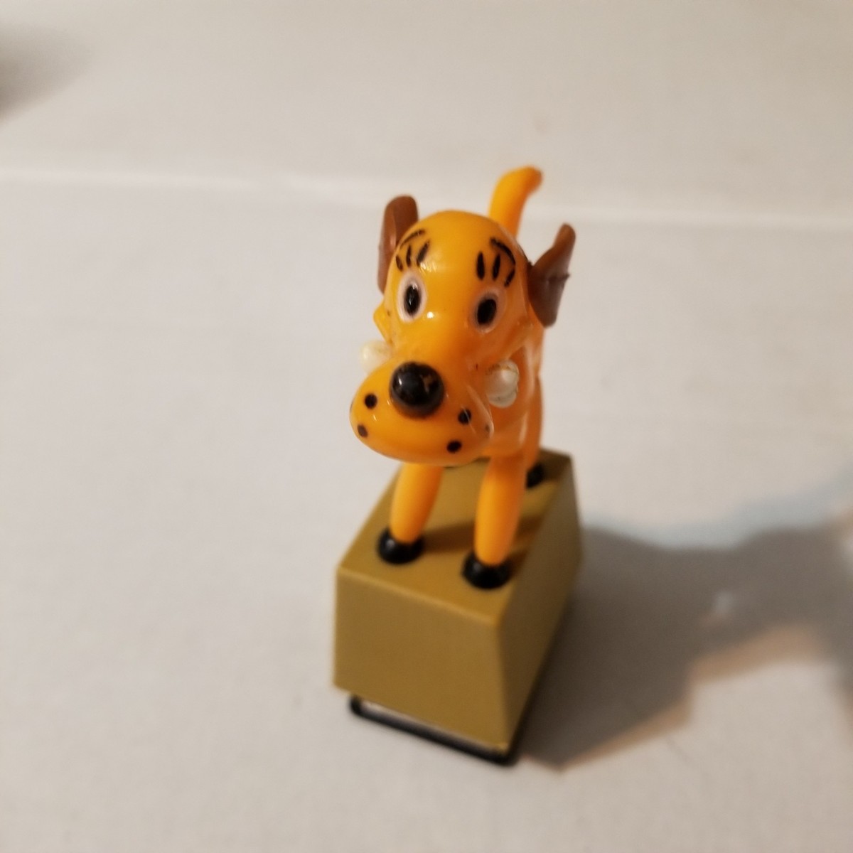 MODERN TOYS Plastic Push Puppet Pencil Sharpener Dog w/ Bone