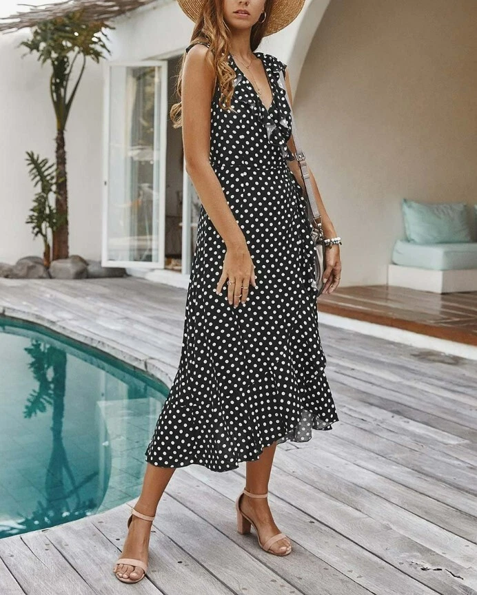 Robe enveloppante accent à pois noir