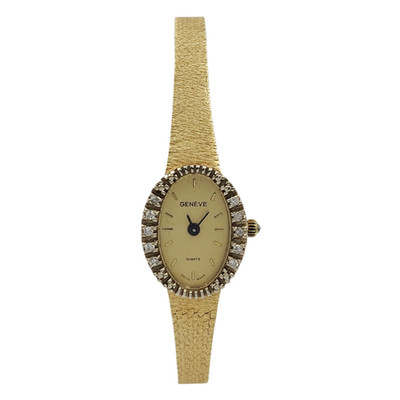 Ladies Geneve Vintage 14K Yellow Gold Watch with Gold Dial and Diamond Bezel.