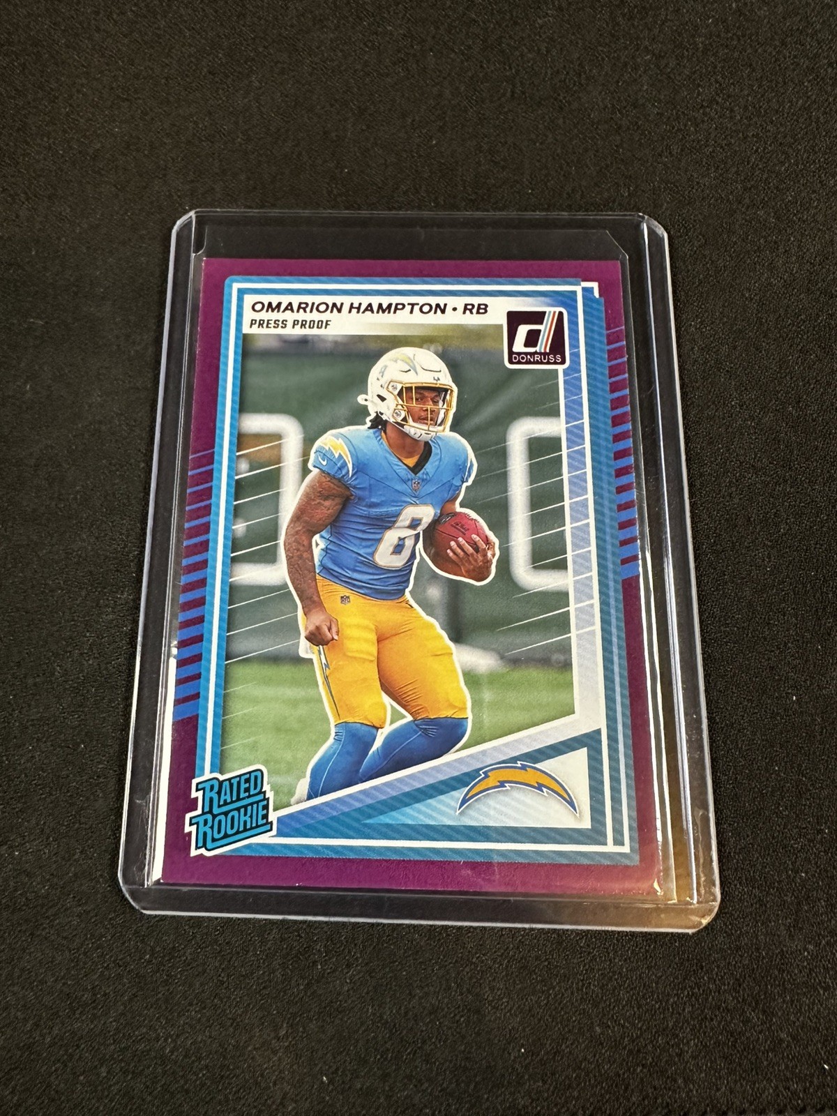 2025 Panini Donruss - Rated Rookie Omarion Hampton #303 Purple Press Proof (RC)