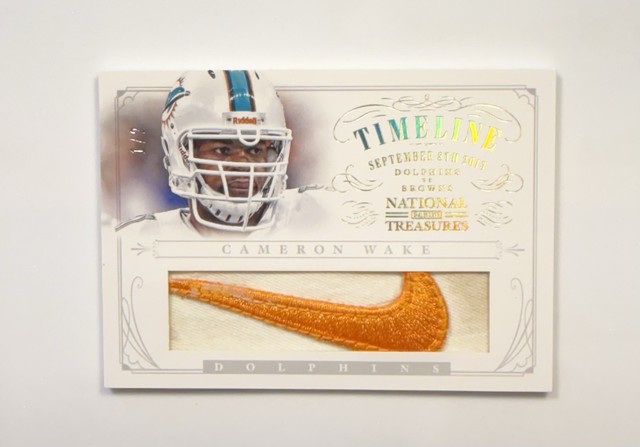 2013 Panini National Treasures Cameron Wake Nike Swoosh Dirty Patch 1/2 Dolphins