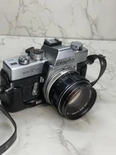 Minolta SRT101 SLR Film Camera Body + MC Rokkor-PF f/1.4 58mm Lens