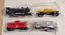 NIP SHELL GAS 4 PIECE TRAIN SET BY FLETCHER BARNHARDT AND WHITE CO. 4-5" EACH