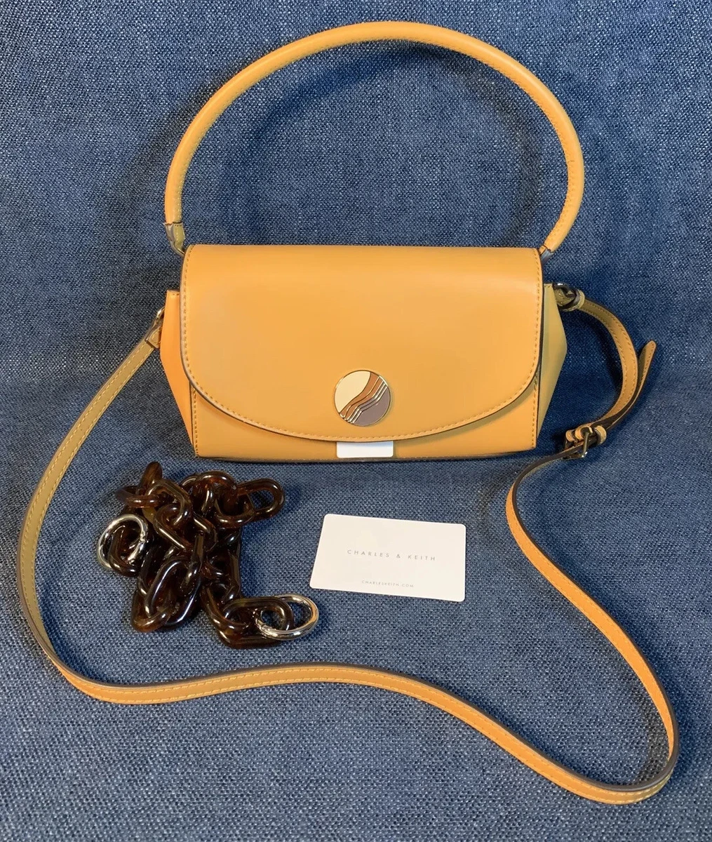 Charles and keith plush powder bag price new arrivals