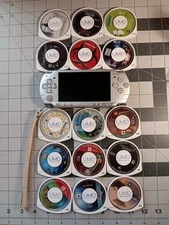 Sony PSP 2001 Slim Handheld System - Silver with 6 movies & 9 games