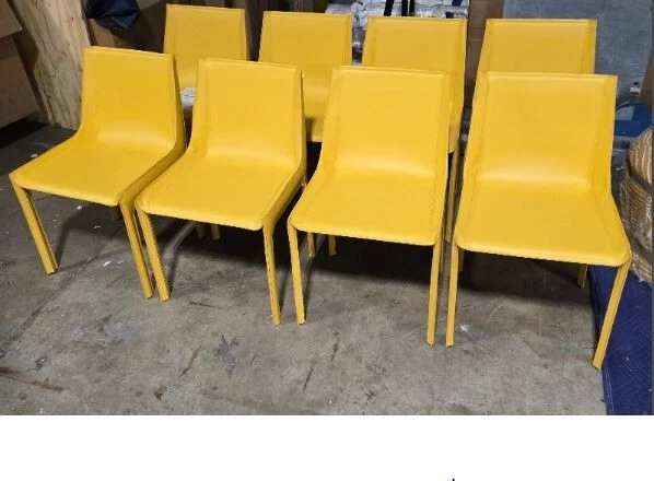 Sillas Nisida en Frag/Minotti de cuero amarillo de Calvi y Brambilla Foto 2 de 4